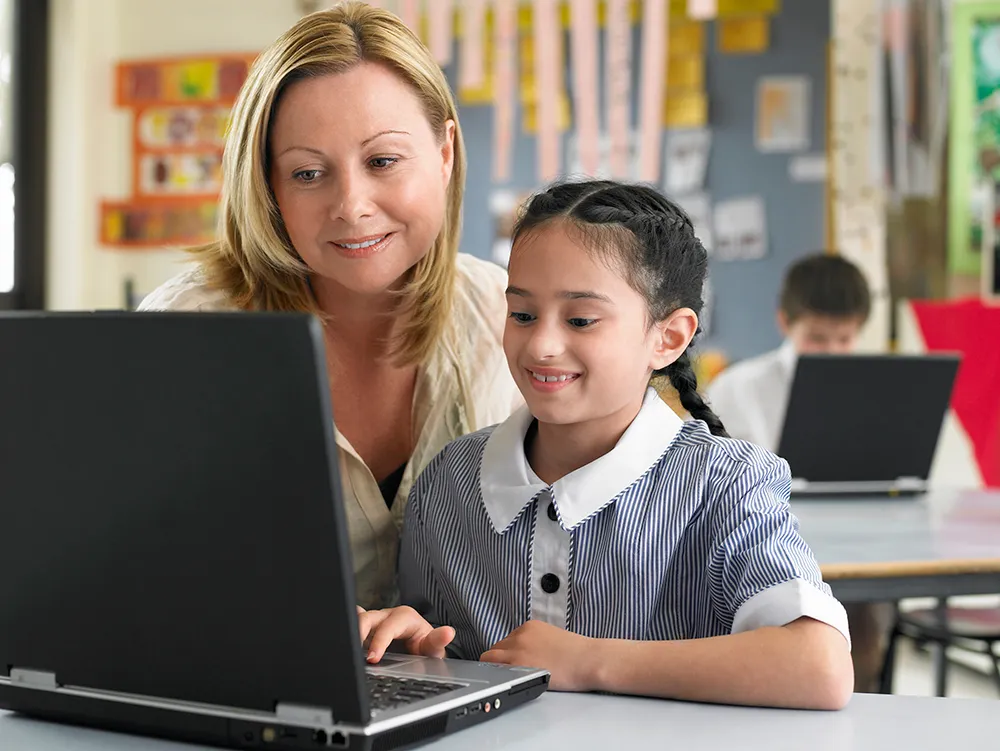 a teacher and student at school